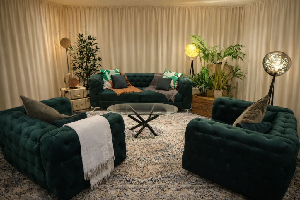 Green room with comfortable green sofa's and stylish floor lamps